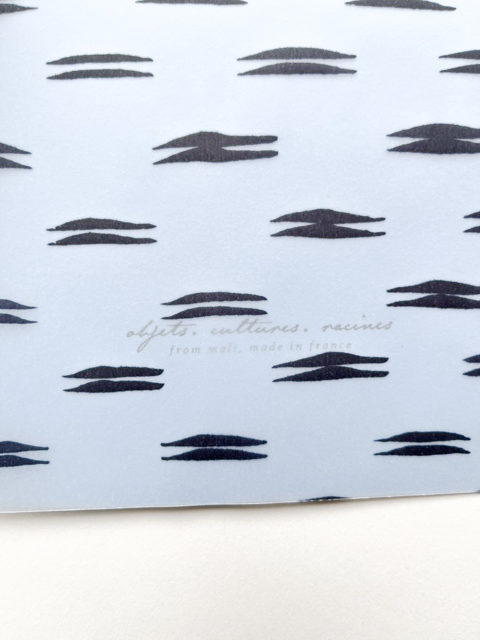 Gros plan texture papier et reliure couture du carnet de notes A5 Musso Maison Bogo